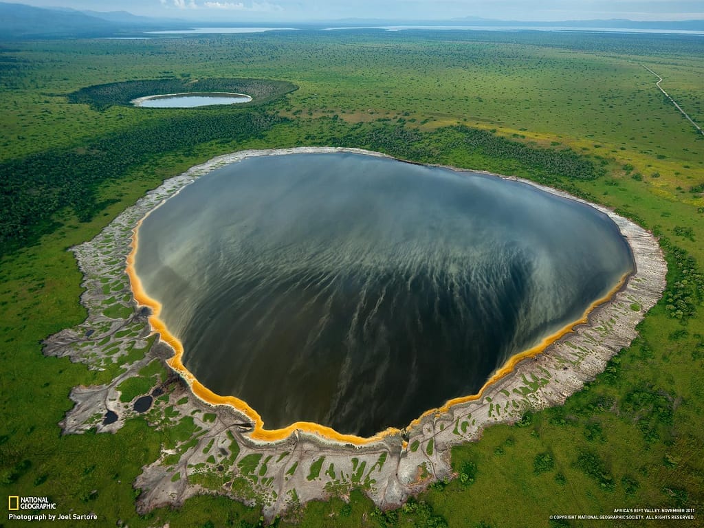 25+ Best Tourism Photos of Uganda: Stunning Pictures. Upclose: A crater lake in Queen Elizabeth National Park i. Half crater, half lake
