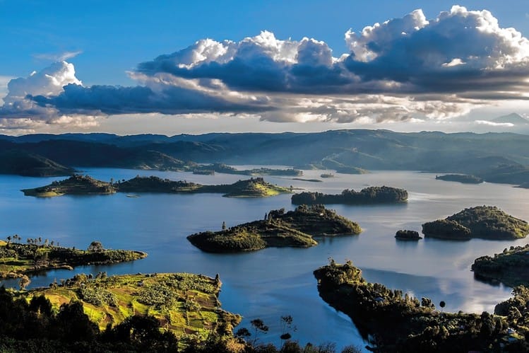 25+ Best Tourism Photos of Uganda: Stunning Pictures. Panoramic view of Lake Bunyonyi, one of the best tourism photos of Uganda's scenic lakes